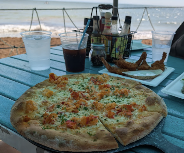 Seaside Cafe at the Mansion signature dishes Lobster PizzaHoney Butter Lobster Wood Fired Caprese Sandwich